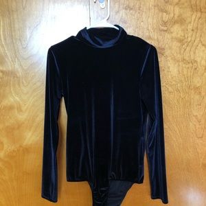 Crushed velvet long sleeved onesie.
